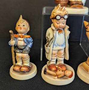 Assorted Hummel Little Boy Figurines