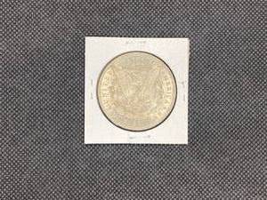 1885 Morgan Silver Dollar Marked MS63 When Purchased