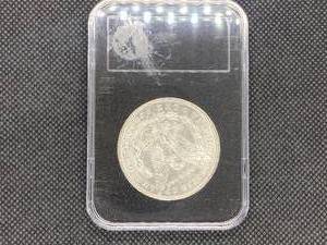 1900-O Brilliant Uncirculated Morgan Silver Dollar in holder