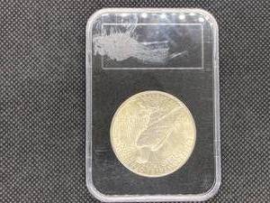 1925 Brilliant Uncirculated Peace Silver Dollar in holder
