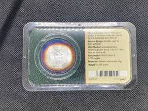 2005 Uncirculated American Silver Eagle in Original sealed Littleton Holder Beautifully Toned