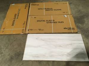 Lot of Assorted Ivy Hill Tile Saroshi Dolomite Snow 23.62 in. x 47.24 in. Polished Marble Look Porcelain Floor and Wall Tile (15.5 sq. ft. Case) (8 Pieces)  Customer Returns See Pictures