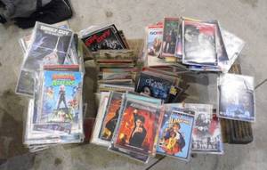 lot 12 image: MASSIVE collection of DVDs from a variety of genres Classics, Action, adventure,  comedy and lots of family friendly movie
