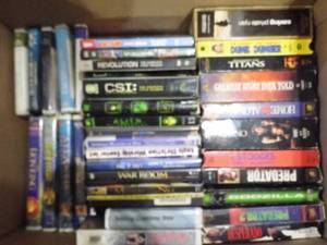 lot 13 image: HUGE collection of DVD and VHS movies from family friendly, religious themed,  action and some classics.