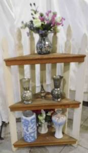 lot 15 image: White picket fence themed Corner shelf with collectible porcelain vases, Silver-tone vintage vases and more