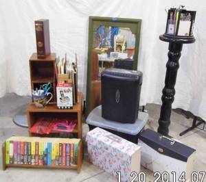 lot 17 image: Office supplies and decor to accommodate a variety of needs Paper shredder, file boxes, shelving, desktop and other style organizers, novels as well as Vintage National Geographic Magazines and more