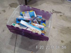 lot 27 image: Covered tote containing a ton of daily use household products