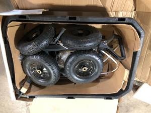 lot 31 image: GORILLA CARTS 7 cu. ft. Poly Yard Dump Cart Costumer Returns See Pics