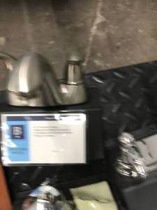 lot 27 image: 2 HANDLE BATHROOM SINK FAUCET