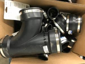 lot 140 image: ASSORTED BLACK RUBBER PLUMBING PARTS