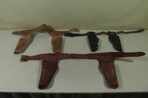 lot 18 image: Assorted Toy Gun Holsters with Belts