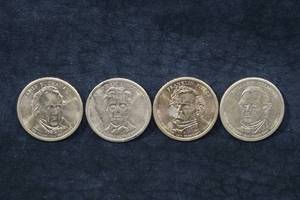 lot 53 image: US Presidential $1 Coins - Buchanan, Lincoln, Pierce, Fillmore