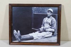 lot 155 image: Framed Black and White Satchel Paige Photo