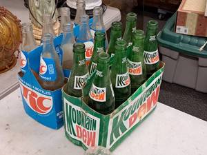 lot 385 image: Lot of (2) Vintage 8-Pack Glass Pop Bottles - Mountain Dew, RC Cola
