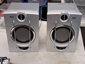 lot 390 image: Lot of (2) RCA 11 6-ohm 80W Stereo Speakers RS2052