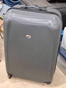 lot 123 image: American Tourister Rolling Suitcase