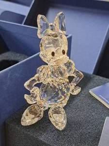 lot 4 image: Swarovski 3-12 Daisy Duck theme Crystal Table Statue