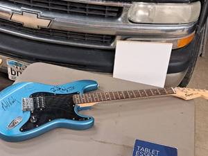 lot 9 image: Fender Squier Bullet Signed Guitar (signed by Earth, Wind and Fire band members)