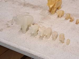 lot 430 image: Lot of (7) Elephant Herd theme Marble Table Statues