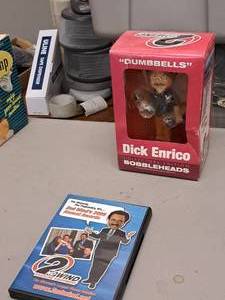 lot 511 image: Lot of (2) Dick Enrico Collectibles (in original packaging) - Dumbbells Bobblehead, 2nd Winds 2005 Annual Awards