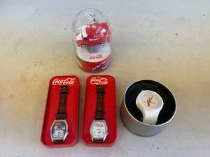 lot 54 image: Coca-Cola Lot - Watches