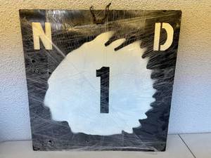 lot 80 image: Metal ND Road Sign Artwork