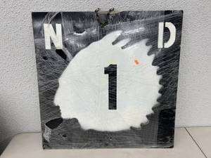 lot 83 image: Metal ND Road Sign Artwork