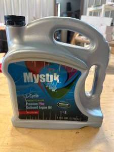 lot 24 image: Mystick JT4 1 Gallon Synthetic Blend Oil