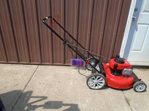 lot 106 image: Troy Bilt push mower. Looks lightly used. Tested & works. As shown.