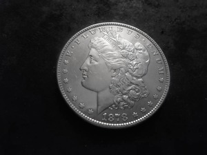 lot 12 image: 1878 Morgan Silver Dollar 8 Tailfeathers