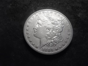 lot 29 image: 1884 S Morgan Silver Dollar