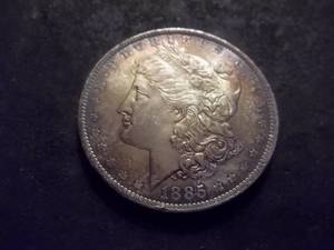 lot 31 image: 1885 O Morgan Silver Dollar