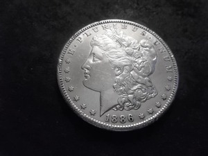 lot 35 image: 1886 S Morgan Silver Dollar