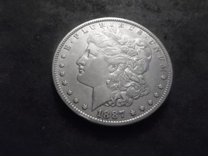 lot 37 image: 1887 O Morgan Silver Dollar