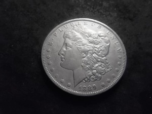 lot 42 image: 1889 O Morgan Silver Dollar