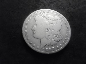 lot 53 image: 1897 O Morgan Silver Dollar