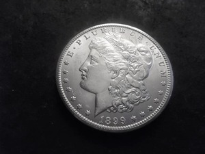 lot 55 image: 1899 O Morgan Silver Dollar