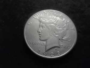 lot 69 image: 1928 S Peace Silver Dollar