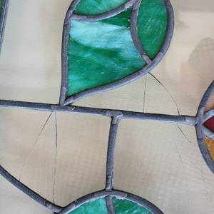 lot 43 image: Antique Flower and Vine Stained Window Panel, as