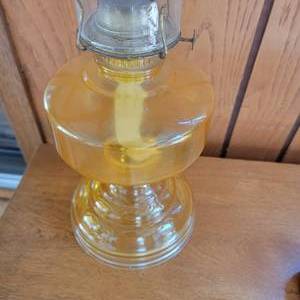 lot 69 image: Yellow Glass Pedestal Base Oil Lantern