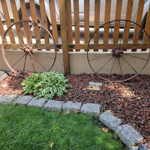 lot 85 image: Old Rustic Iron Wagon Wheels, pair