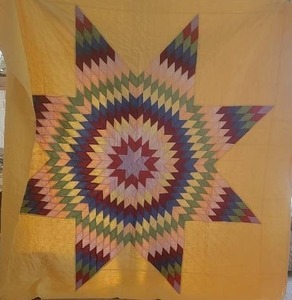 lot 67 image: Vintage Handstitched Star of Bethlehem Feedsack Quilt