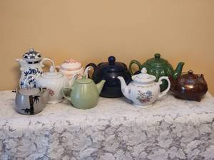 lot 133 image: Collection of 9 Teapots