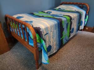 lot 42 image: Twin Jenny Lind Inspired Bed Frame
