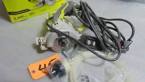 RYOBI 12 -Amps 4 in. Blade Corded Wet Tile Saw  Model # TC401 UPC Code #  033287164493