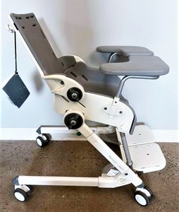 MSRP $1600 R82 Flamingo Commode &amp Bathing Chair with Swing Away Tray Armrests -&nbspTilt-in-space and back recline function -&nbspIt can assist children with special needs with their seating posture - Great Condition