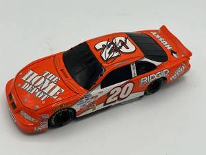 lot 38 image: Autographed NASCAR Tony Stewart 124 Orange Home Depot 1999 Pontiac Diecast Stock Car - No COA