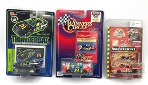 lot 53 image: Vintage 164 NASCAR Stock Car Toy Lot - Jeff Gordon  Tony Stewart  Bill Elliott (SEALED)