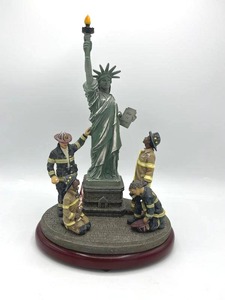 lot 74 image: 2001 Red Hats of Courage United We Stand Music Box in Good Working Condition