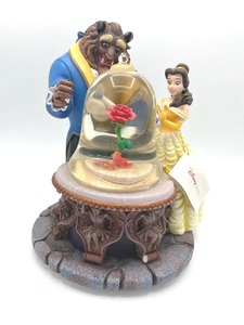 lot 83 image: Walt Disney Store Beauty and The Beast Belle Rose 10 Musical Snow Globe (Working)